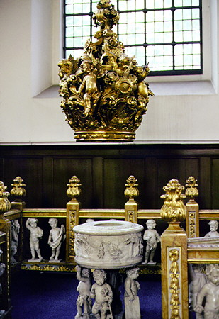 Baptismal font under crown in the Church of the Redeemer, Kobenhavn. Denmark.