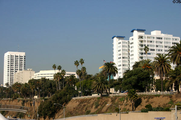 Former Lawrence Welk Plaza (1971) (21 floors) (100 Wilshire Blvd.) by DMJM & Pacific Plaza with blue caps (16 floors) (1431 Ocean Ave.) on cliffs above ocean. Santa Monica, CA.