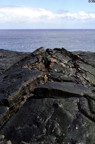 Buckled lava on sea in Volcanoes National Park. Big Island of Hawaii, HI.