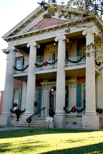 Magnolia Hall (c1858) (Pearl at Washington St.) is last mansion built in Natchez prior to Civil War now hosts costume museum. Natchez, MS. Style: Greek Revival. On National Register.