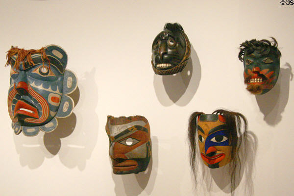 Collection of Northwest Coast native wooden human face masks (1830-1979) at Seattle Art Museum. Seattle, WA.