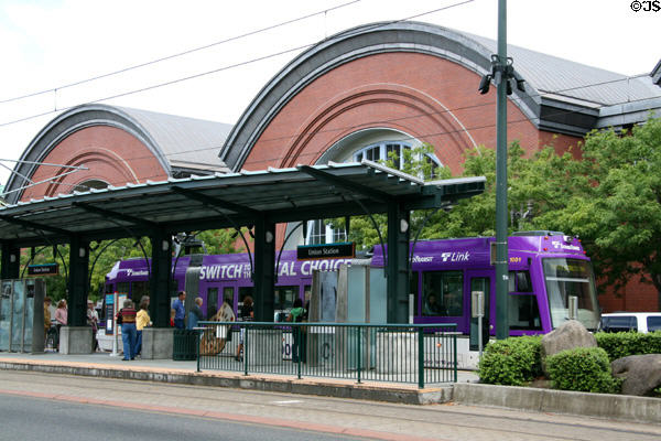 SoundTransit streetcar passes Washington State History Museum. Tacoma, WA.