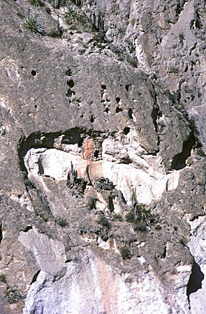 Incan tomb in cave on cliff in Colca Canyon. Peru.