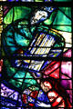 Detail of King David playing harp from stained-glass by Marc Chagall in Cathedral. Metz, France.