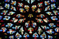 North transept rose stained glass window of St Stephen's Cathedral with Christ & angels. Sens, France.
