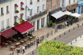 Cafés & shops along street below Royal Chateau of Amboise. Amboise, France