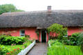 Golden Vale Farmhouse, home of a well-to-do farmer, at Bunratty Castle & Folk Park. County Clare, Ireland.