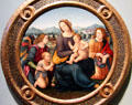 Madonna & Child with four angels & St John the Baptist painting by Lorenzo di Credi & workshop at Uffizi Gallery. Florence, Italy.