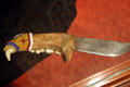 Native knife with beaded hilt of Kodiak bear jaw at Museum of Idaho. Idaho Falls, ID