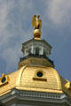 Detail of gold dome of New Hampshire State House. Concord, NH