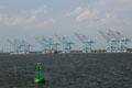 Container port cranes in Norfolk harbor. Norfolk, VA.