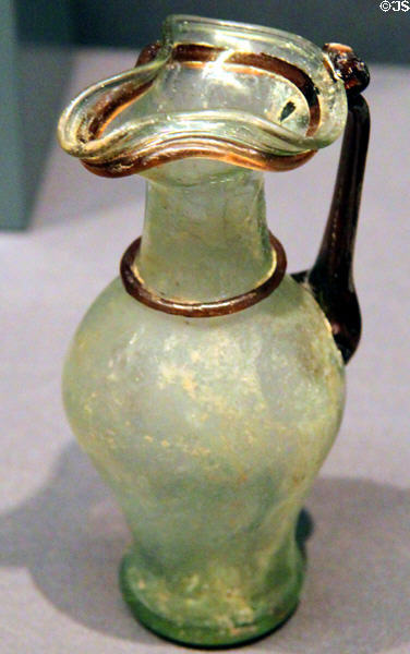 Roman glass handled jug (3rd-4thC) at Kunsthistorisches Museum. Vienna, Austria.