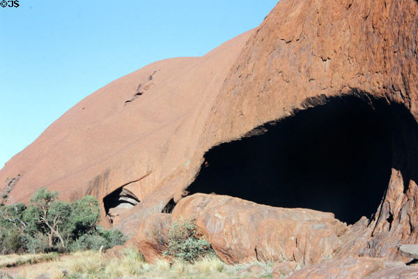Massive cave opening on side of Uluru (aka Ayers Rock). Australia.