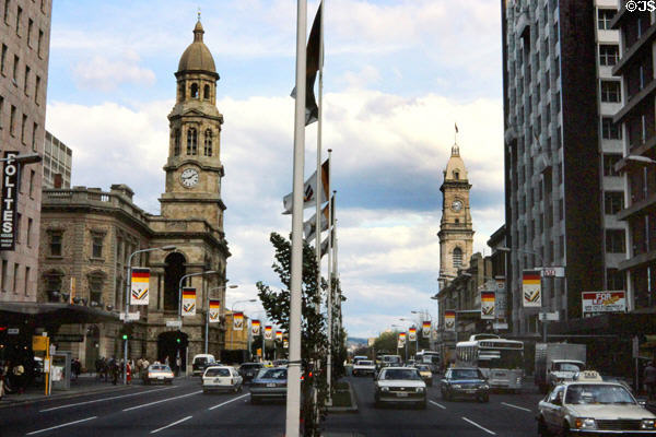 Facing clock towers of Adelaide Town Hall & Post Office across King William Street in Adelaide. Adelaide, Australia.