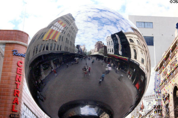 Adelaide Mall as seen in a reflecting ball on street. Adelaide, Australia.