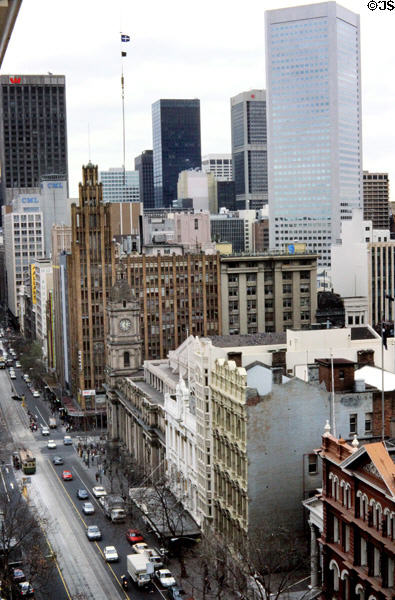 Heritage buildings along Collins St. with modern office towers beyond. Melbourne, Australia.