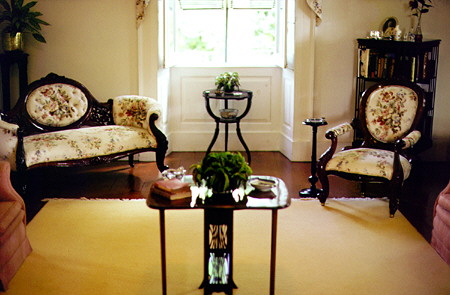 Interior of the Francia Plantation featuring a Victorian love-seat & chair. Barbados.