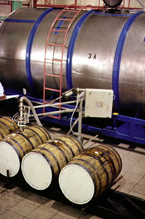 Barrels being filled at the Foursquare Rum Distillery at Heritage Park. Barbados.