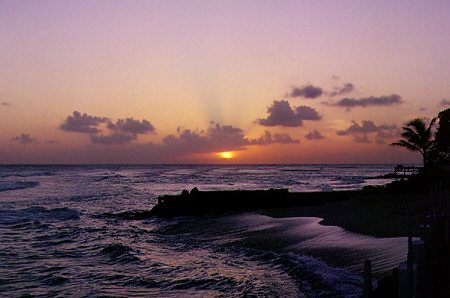 Sunset above the water at Lawrence Gap. Barbados.