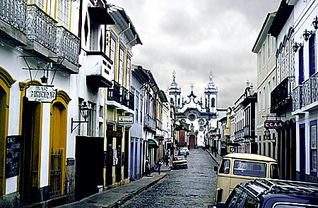 Streets of São João del Rei with Igreja de Nossa Senhora do Carmo in the distance. Brazil.