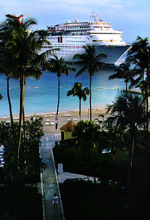 Cruise ship off Hilton Colonial Hotel beach. Nassau, The Bahamas.