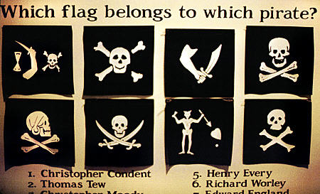 Pirate Museum flag quiz. (Answers l-r, top: Moody, Worley, Tew, England; row 2: Every, Rackman, Blackbeard, Condent). Nassau, The Bahamas.