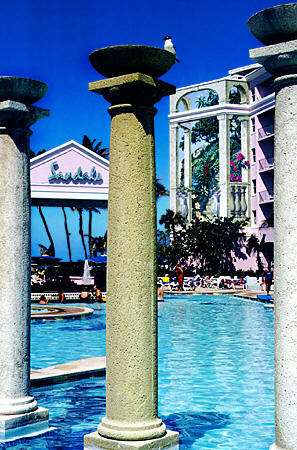 Columns rise from water of pool at Sandals hotel on Cable Beach. The Bahamas.