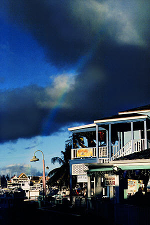 Rainbow over Port Lucaya and rainbow. The Bahamas.