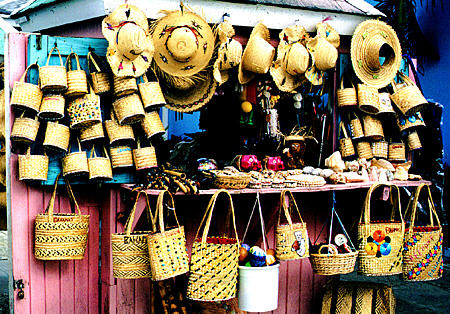 Straw baskets & hats at Port Lucaya Marketplace. The Bahamas.