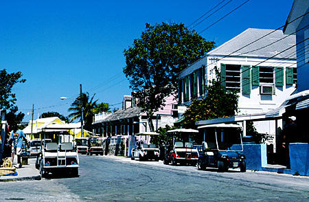 Bay Street with golf carts, only mode of transport on Harbour Island. The Bahamas.