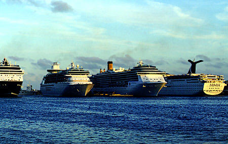 Cruise ships reflect sunset. Nassau, The Bahamas.