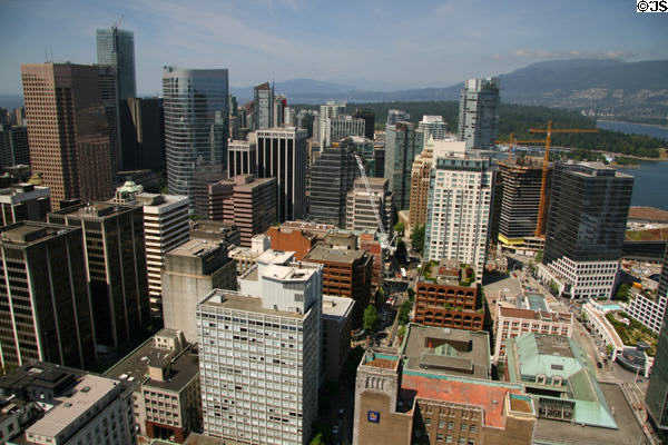 Vancouver downtown skyline looking west from Harbour Centre observation deck toward Stanley Park. Vancouver, BC.
