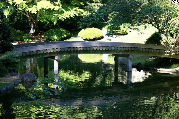 Arched wooden bridge in Nitobe Memorial Garden at UBC. Vancouver, BC.