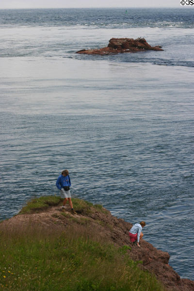 Hikers explore Bay of Fundy. NB.