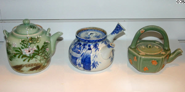 Porcelain tea pots (2 Chinese Qing dynasty & Japanese c1890) at New Brunswick Museum. Saint John, NB.