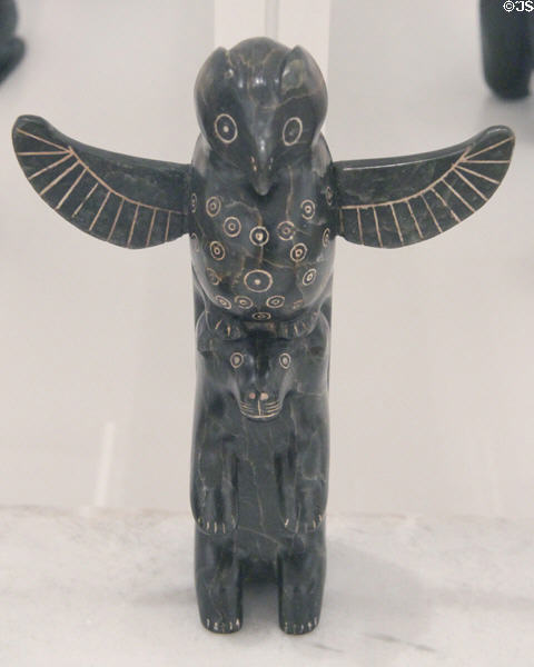 Inuit black stone carving of totem (c1952) from Quebec at National Gallery of Canada. Ottawa, ON.