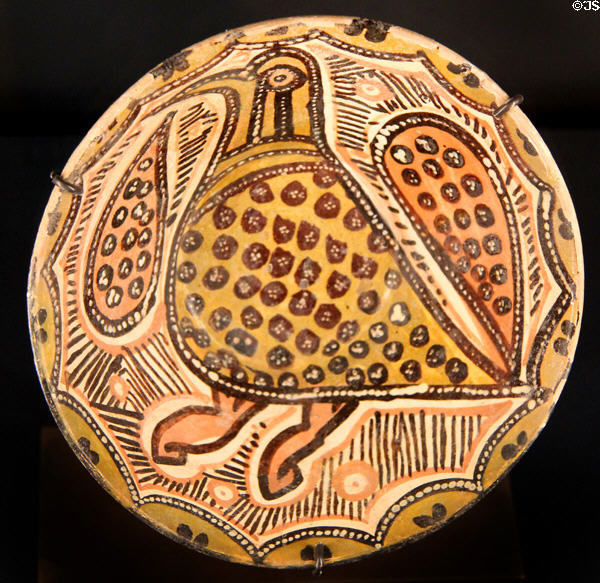 Earthenware bowl with underglaze slip-painting bird (10th-11thC) from Northern Iran at Aga Khan Museum. Toronto, ON.