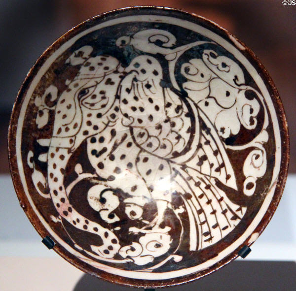 Luster Fritware bowl painted with mythical winged elephant (early 13thC) from Iran at Aga Khan Museum. Toronto, ON.