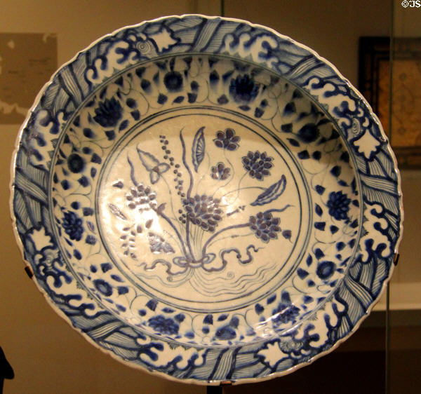 Fritware dish with underglaze painting of flowers (17thC) from Iran at Aga Khan Museum. Toronto, ON.