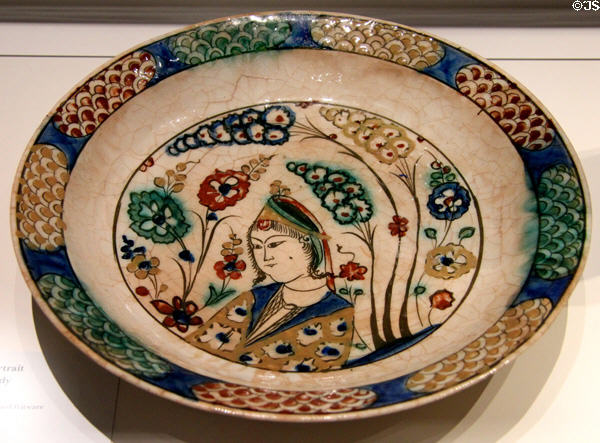 Fritware dish with underglaze painting of court lady (early 17thC) from Iran at Aga Khan Museum. Toronto, ON.