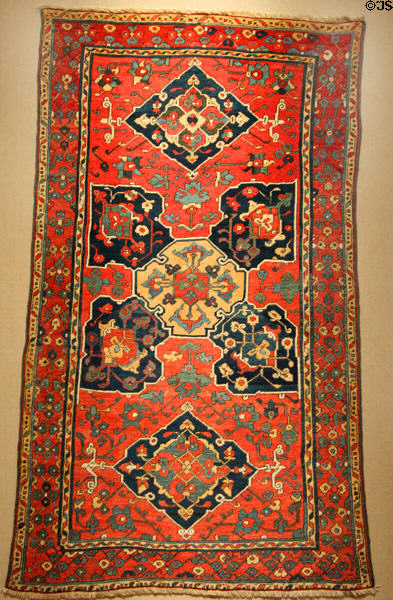 Wool Turkish carpet (late 18thC) with four-leaf clover pattern after Ushak design at Aga Khan Museum. Toronto, ON.
