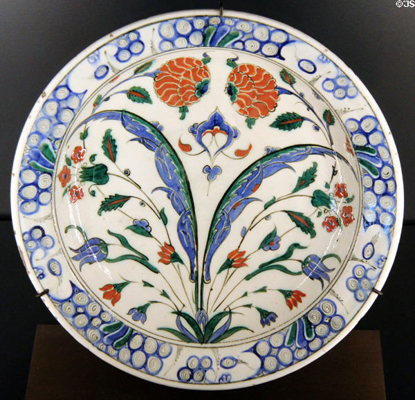 Fritware dish painted with flowers (1550-75) from Iznik, Turkey at Aga Khan Museum. Toronto, ON.