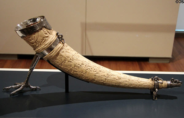 Ivory horn (oliphant) (12thC, silver mounts 17thC) carved in Sicily with mounts from England showing rows of animals at Aga Khan Museum. Toronto, ON.