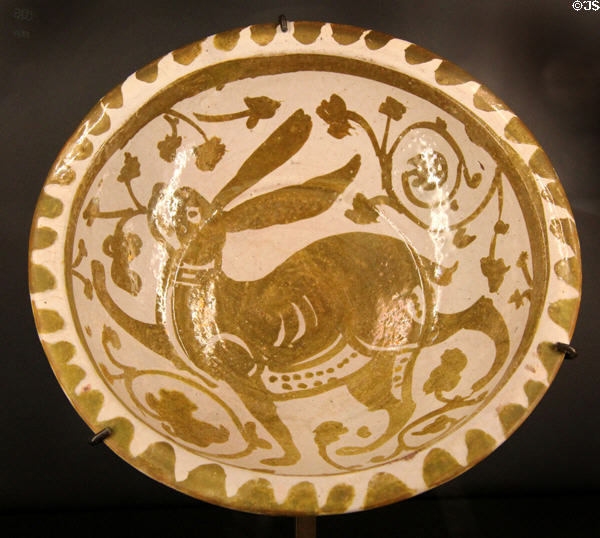 Fritware bowl with luster painting of rabbit (11thC) from Egypt at Aga Khan Museum. Toronto, ON.