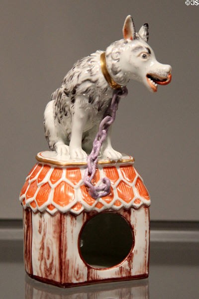 Porcelain figure of dog & kennel (c1740) by Du Paquier of Vienna, Austria at Gardiner Museum. Toronto, ON.