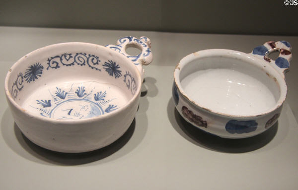 Porringer (1673) & porringer or bleeding bowl (1680-1710) both of English delftware from London at Gardiner Museum. Toronto, ON.