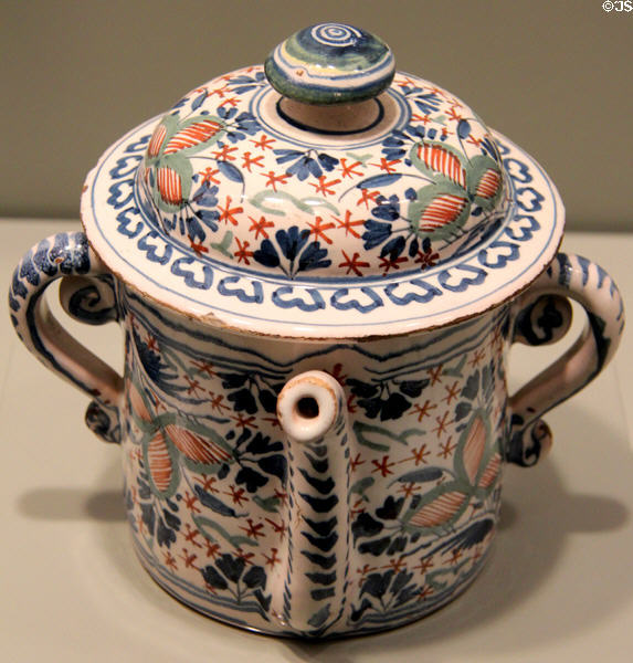 Covered posset pot with red, blue & green flowers on English delftware (1700-20) from Bristol or London at Gardiner Museum. Toronto, ON.
