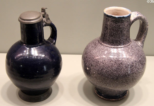 Malling jug in dark blue (1575-1620) from Netherlands & purple jug (1625-50) from London at Gardiner Museum. Toronto, ON.