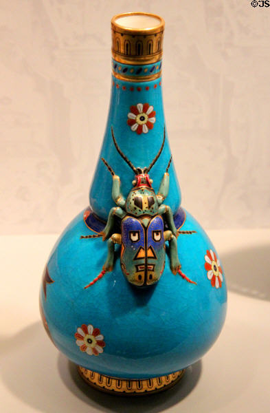 Bone china bottle vase with scarab beetle in Japonesque style (c1870) by Christopher Dresser for Minton of Stoke-on-Trent, England at Gardiner Museum. Toronto, ON.