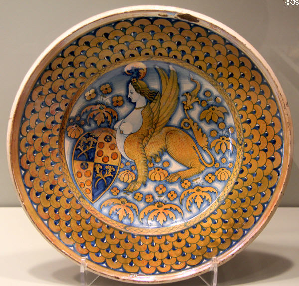 Majolica dish with coat of arms held by sphinx (1500-30) from Deruta, Italy at Gardiner Museum. Toronto, ON.